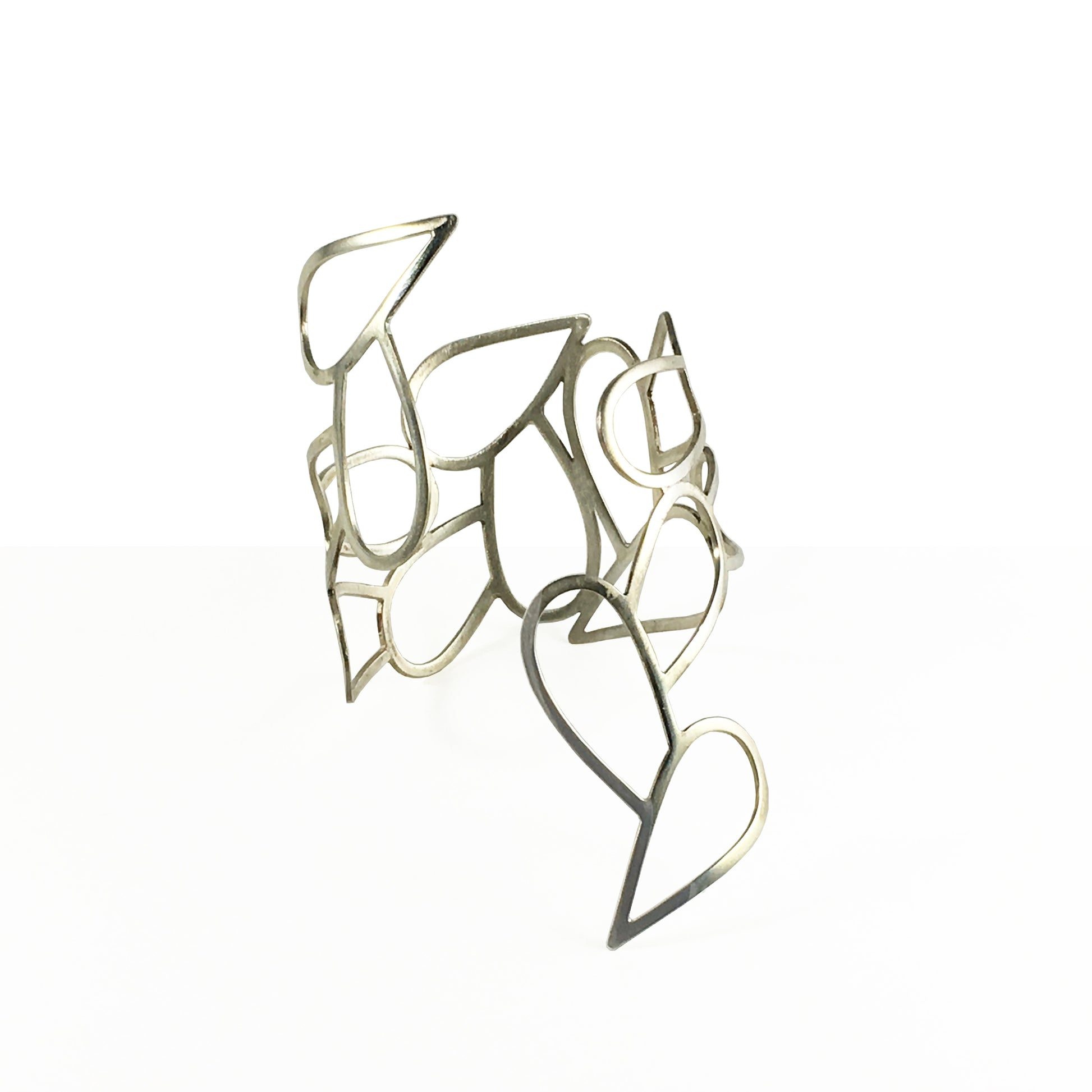 Helena Collection bring the beauty of the ancient Greek world to the contemporary woman. All pieces are cut bent polished and personally handcrafted by Laura. Laura’s collections reflect her love of architecture organic and natural shapes simplicity subtlety sensuality exclusive designs synthesized in every piece.