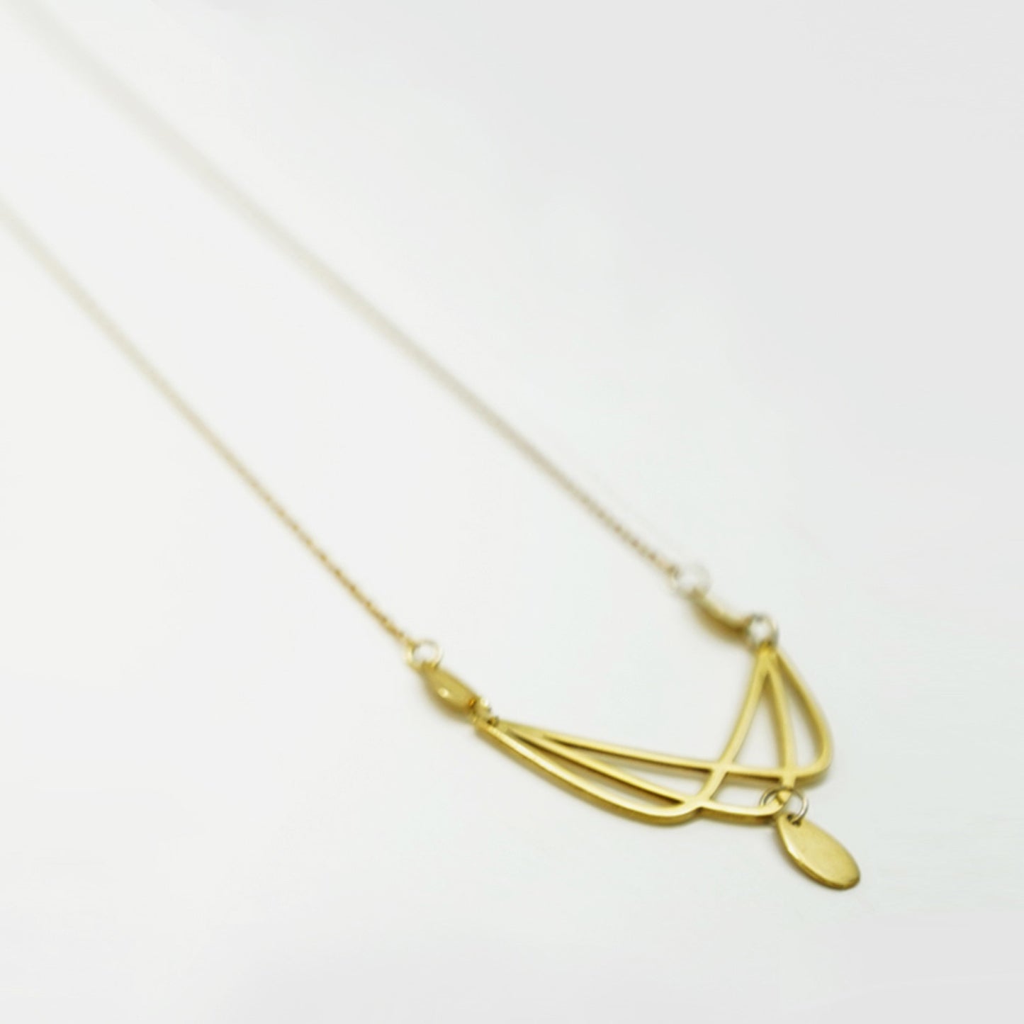 GUIMARD NECKLACE BOOMERANG / silver 925, 18kt gold plated