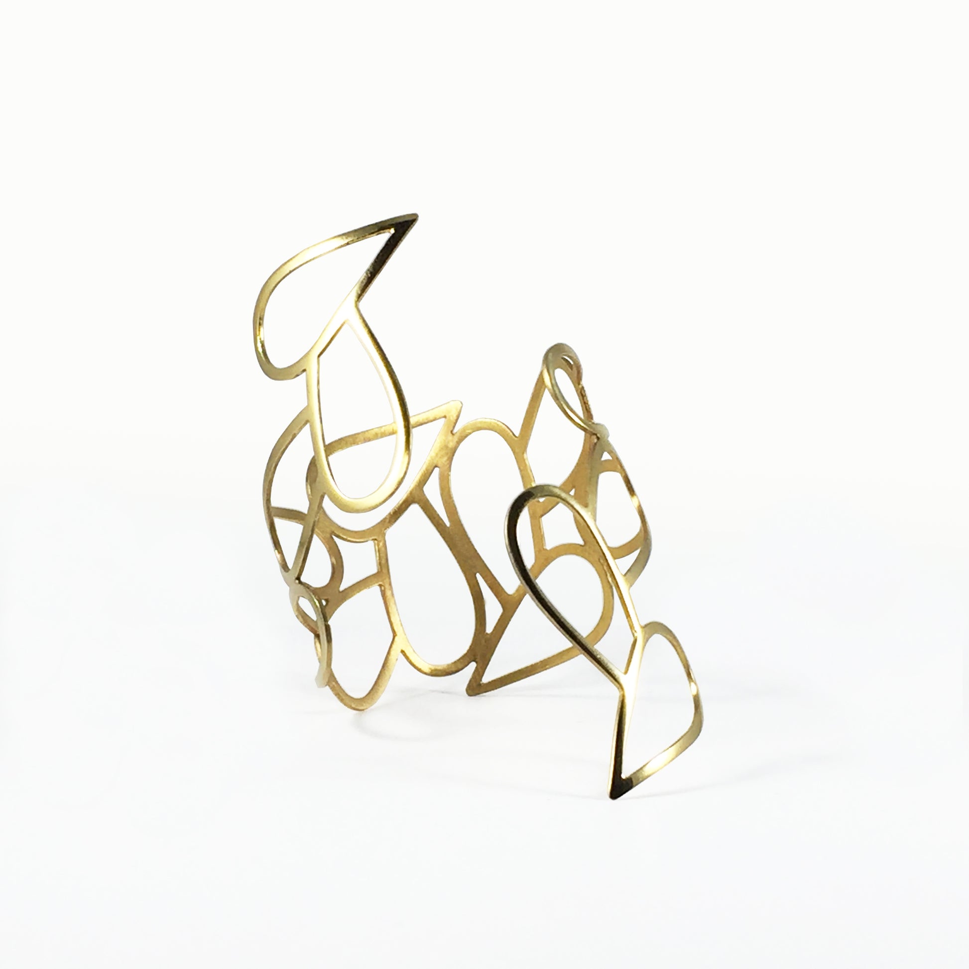 Helena Collection bring the beauty of the ancient Greek world to the contemporary woman. All pieces are cut bent polished and personally handcrafted by Laura. Laura’s collections reflect her love of architecture organic and natural shapes simplicity subtlety sensuality exclusive designs synthesized in every piece.